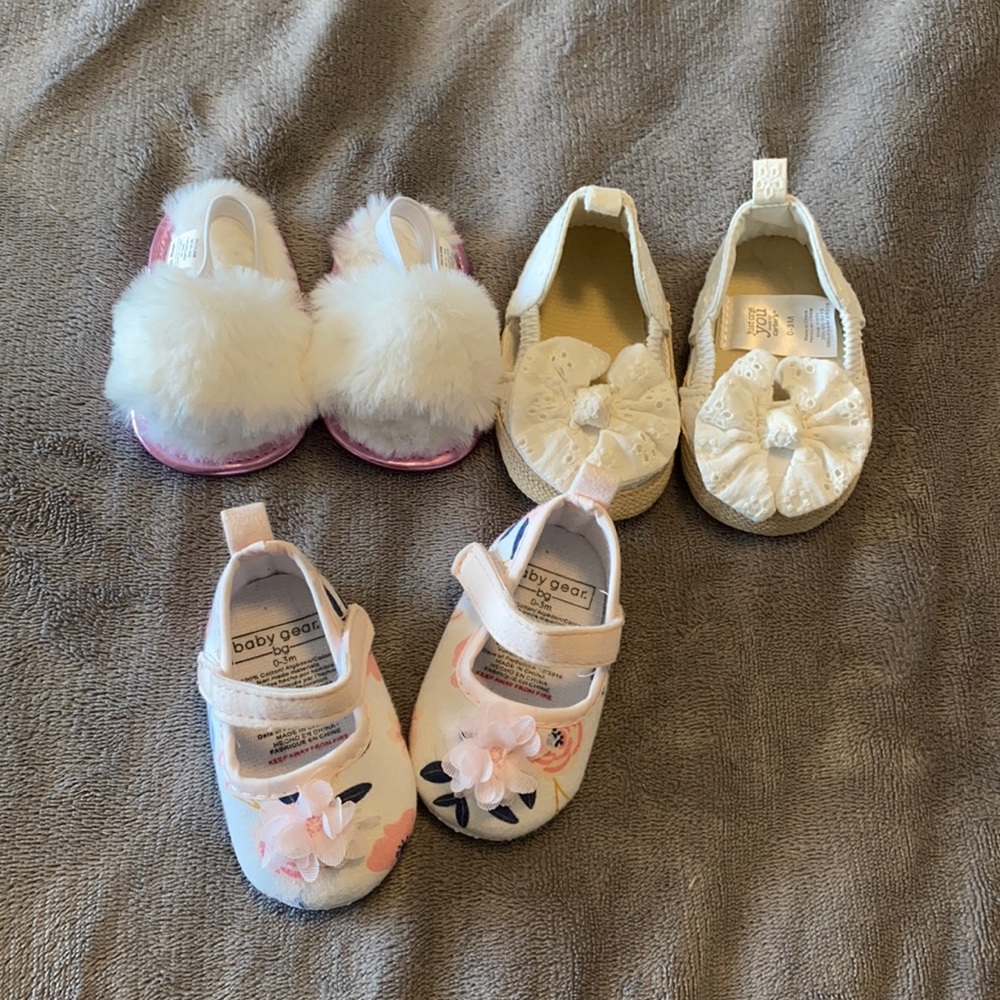Three pairs of crib shoes never worn